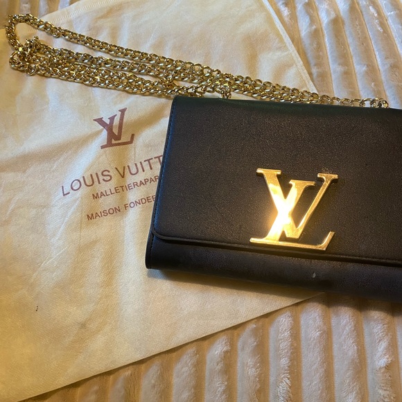 Louis Vuitton Black and Gold Clutch with Iconic LV Logo - Picture 1 of 3